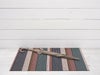 チルウィッチの玄関・キッチンマット　Pleat Stripe柄 Raspberr色